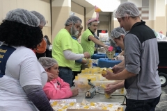 CEC Indianapolis staff and a few family members volunteer at the Million Meal Marathon 2019