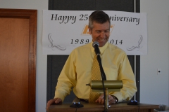 Quatchak speaks at CEC's 25th anniversary in 2014.